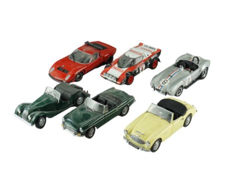 Six Kyosho diecast model cars including a Austin Healey, a Cobra 427, etc, 1:18 scale