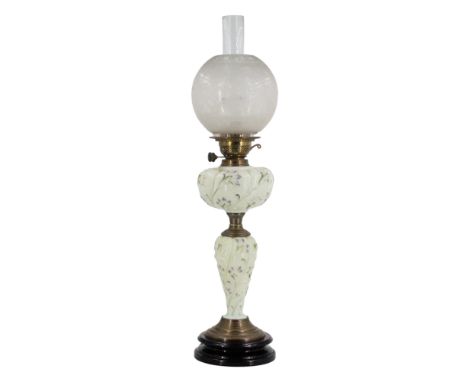 A Victorian mint-green glass oil lamp, having an Aesthetic influenced etched glass globe, Midland Lighting Co brass twin-wick