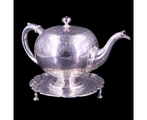 A George II Scottish silver teapot and stand, the former of compressed bullet form decorated with chased shells and floral sc