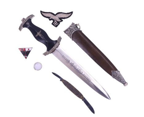 A German dagger, folding knife, ring and badges, (not period)