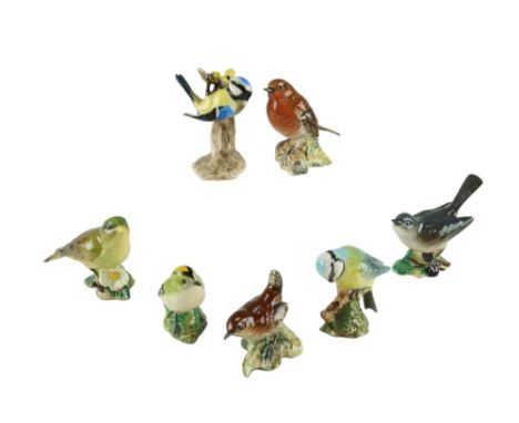 A group of Beswick bird figurines together with a Goebel Blue Tit, latter 9 cm