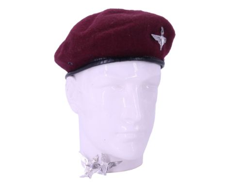 A post-1952 Parachute Regiment beret together with anodised aluminium Staybrite cap and collar badges