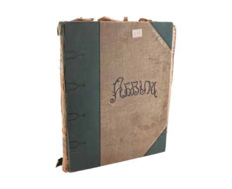 An early 20th Century scrap album containing newspaper cuttings from The Evening Post and similar, period photographs, epitap