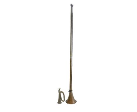 A copper coaching horn and bugle, tallest 93 cm