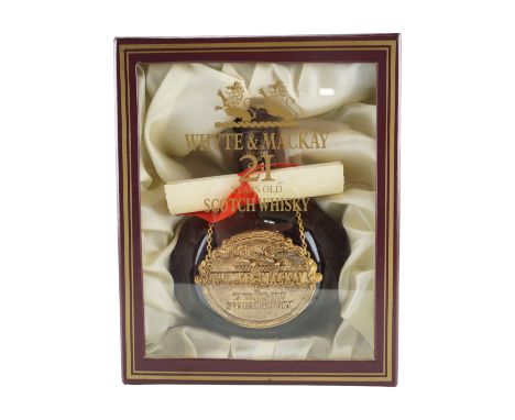 A bottle of Whyte &amp; Mackay 21 Year Old Scotch Whisky, in presentation case with scroll, 75 cl