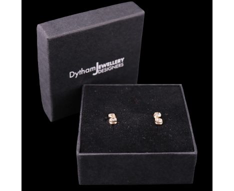 A pair of contemporary diamond earrings, each comprising a vertical pair of brilliant-cut diamonds of approx .2 ct aggregate 