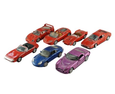 Seven Hot Wheels diecast model cars including a Ferrari F40, a TVR Speed 12, etc, 1:18 scale