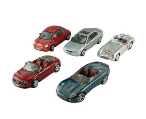 Five Maisto diecast model cars including a Jaguar X-Type (2001), a Jaguar XK 180, etc, 1:18 scale