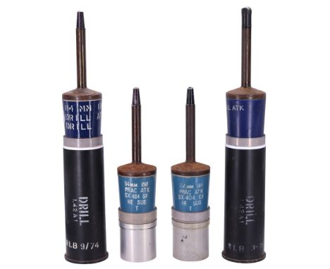 Four inert 1970s British army practice and drill Carl Gustav 84 mm anti-tank gun rounds