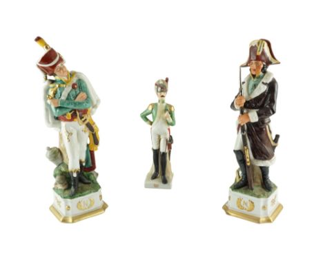 Two Cacciapuoti-style Napoleonic porcelain figurines being hand-painted, gilt-enriched and bearing the gilt emblem of Napoleo