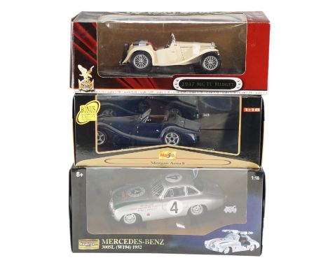 Three boxed diecast model cars comprising a 1947 MG TC Midget, a Morgan Aero S and a 1952 Mercedes-Benz 300SL, 1:18 scale