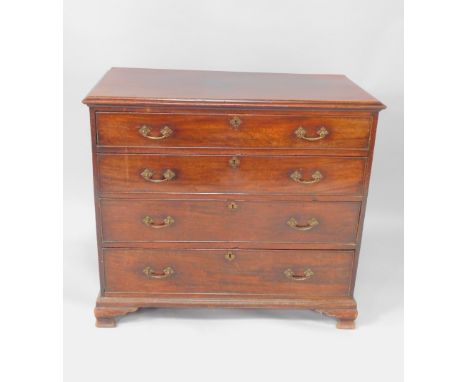 A George III mahogany chest of drawers, with four graduated drawers raised on ogee bracket feet, 103cm H, 51.5cm W, 93cm D.