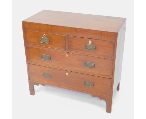 A George IV mahogany and ebony line inlaid chest of drawers, with two short over two long drawers, raised on bracket feet, 84