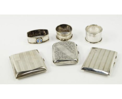 A George V silver cigarette case, with engine turned decoration, Chester 1929, cigarette case with foliate engraved decoratio