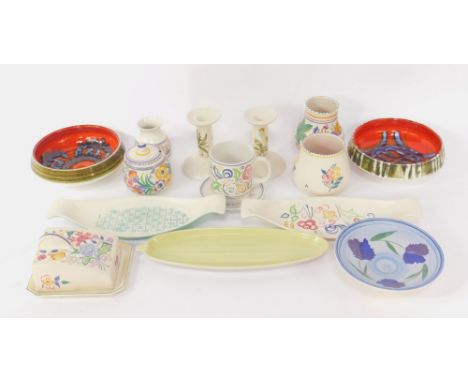 A group of Poole pottery, including vases, cheese dish and cover, and preserve pot, traditionally decorated with flowers, tog