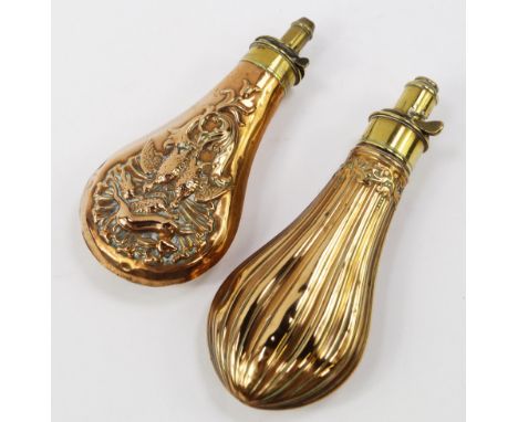 A 19thC copper and brass powder flask, embossed with hung game and foliate scrolls, 19cm long, and a further copper and brass