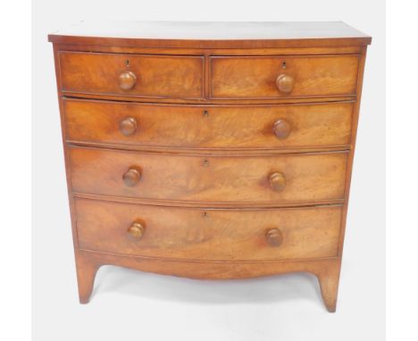 A Victorian bow front mahogany chest of drawers, two short over three long graduated drawers, raised on bracket feet, 104cm H