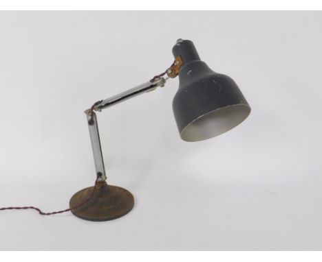 An aluminium and cast iron angle poise type table lamp, 58cm H.
