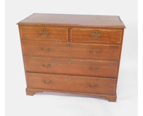 A George III oak and rosewood cross banded chest of drawers, with two short over three long graduated drawers, raised on brac