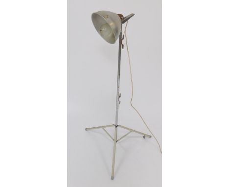 A Paterson late 20thC aluminium and steel tripod lamp, bears label for The Design Centre, London, 124cm high.