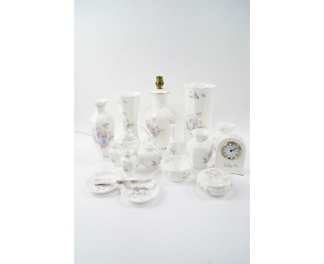 A group of Aynsley porcelain decorated in the Little Sweetheart pattern, including a baluster table lamp, vases, a bell, mant