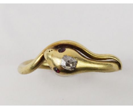 A diamond and ruby set serpent ring, in yellow metal, size K, 3.6g.