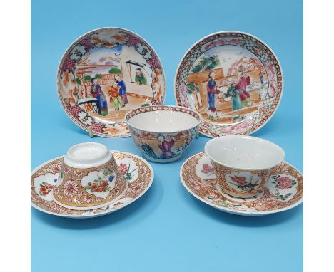 A small group of Chinese export wares, including a pair of tea bowls and saucers, another tea bowl and saucer, and a matching