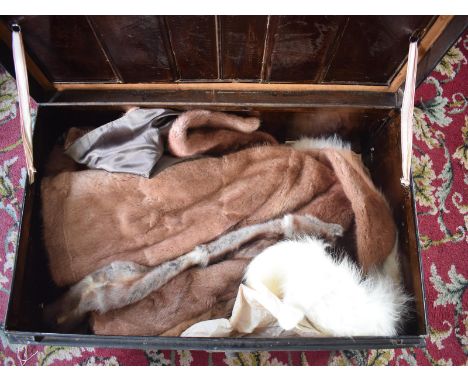 Assorted furs, including stoles, in a tin trunk, 80 cm wide, removal cost A 