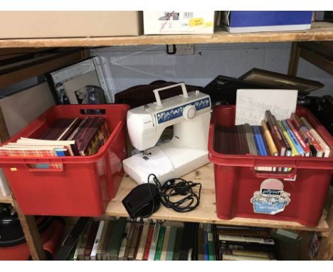 Shelf of assorted including a Toyota sewing machine