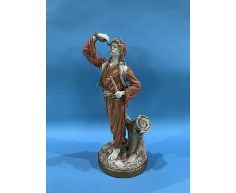 A Royal Worcester figure of Chunguin Indian Snake Charmer by J. Hadley