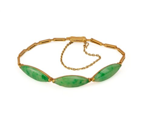 A JADE BRACELET AND A PEARL PENDANT
The bracelet with three marquise shaped jade cabochons, in gold setting, Chinese characte