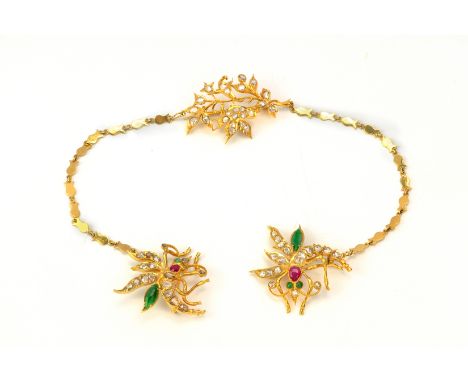 A GEM SET GOLD 'DRAGONFLY' MOTIF KEROSANG
The two end brooches modelled as dragonflies, the central brooch as foliate design,