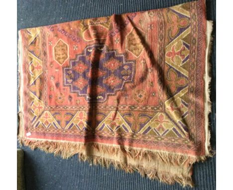 A good tapestry rug decorated in bright colours. Approx. 167 cms x 140 cms. Est. £30 - £40.