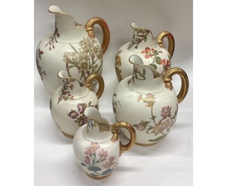 A good set of five Royal Worcester gilt ewers. Est. £80 - £120.