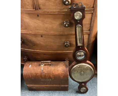 A banjo barometer together with a sewing machine. Est. £20 - £30.