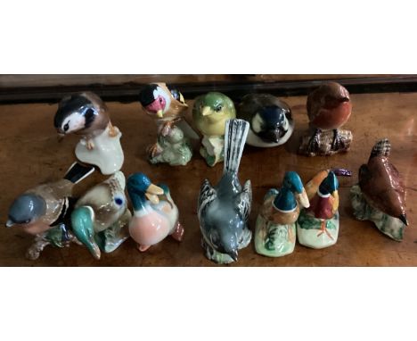 A collection of Goebel and Beswick figures. Est. £30 - £50.