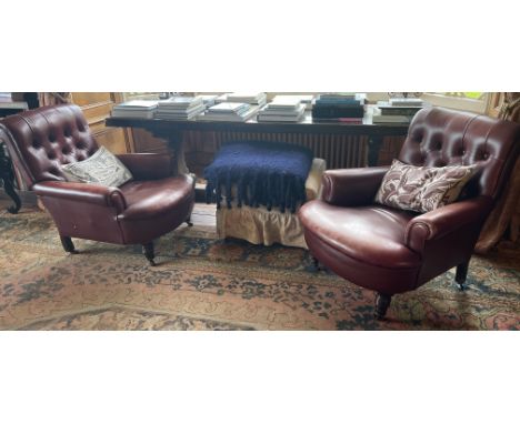 A good matched pair of button back smokers chairs. Est. £50 - £80.