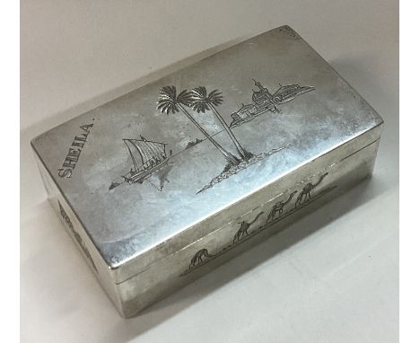 A fine Persian silver engraved snuff box with scene of river and temple. Approx. 158 grams. Est. £150 - £200.