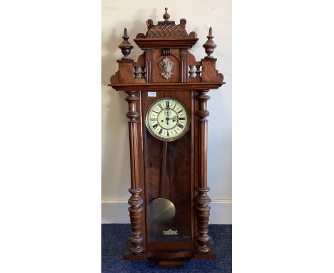 A good mahogany wall clock with enamelled dial. Est. £50 - £80.