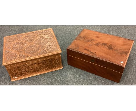 An old carved caddy together with one other. Est. £20 - £30.