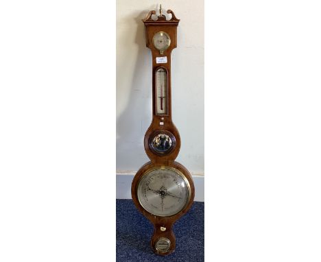 A Georgian mahogany banjo barometer of typical form. Est. £40 - £60.