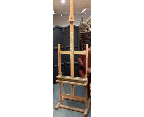 A good artist easel with adjustable back. Est. £50 - £80.