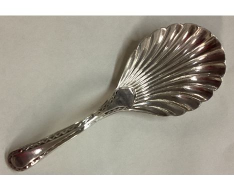 An 18th Century Georgian silver fluted caddy spoon. Sheffield 1786. By John Younge & Co. Approx. 11 grams. Est. £50 - £80. 