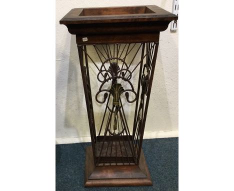 An unusual cast iron mounted stick stand. Est. £20 - £30.