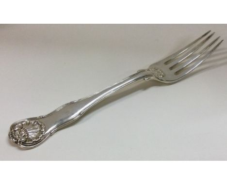 PAUL STORR: A large heavy crested silver fork. Approx. 105 grams. Est. £100 - £150.