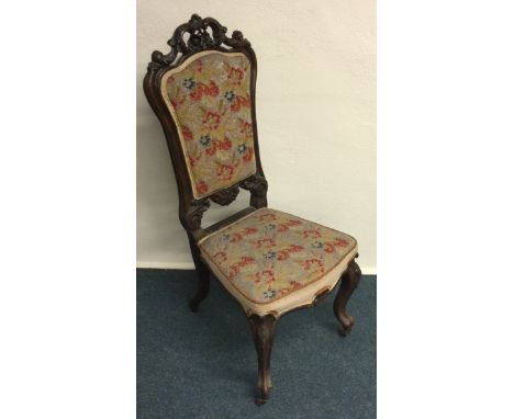 A good Victorian scroll dining chair with tapestry seat. Est. £40 - £60.