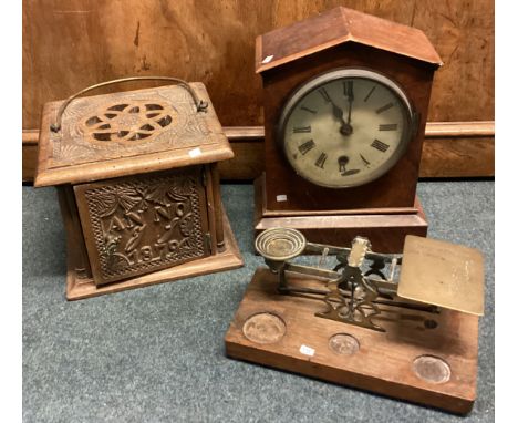 A walnut mantle clock together with a carved box etc. Est. £20 - £30.
