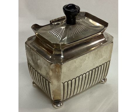A heavy Victorian silver tea caddy of fluted design. Sheffield 1873. By Henry Stratford. Approx. 188 grams. Est. £150 - £200.