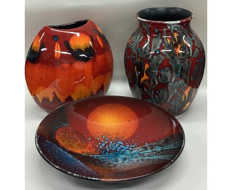 Two large Poole Pottery vases togehter with an Alan Clarke Studio plate. Est. £20 - £30.