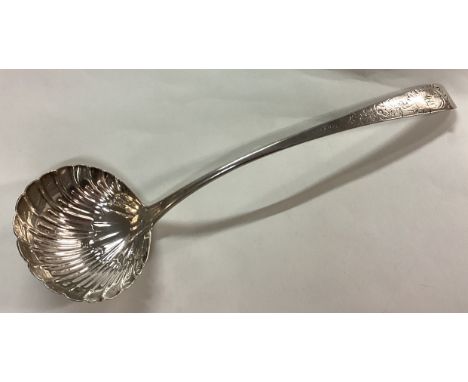 DUBLIN: A fine 18th Century Irish silver engraved soup ladle. Circa 1770. By Michael Keating. Approx. 174 grams. Est. £300 - 